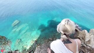 The cute girl passionately sucks dick on the ocean shore, showcasing her skills