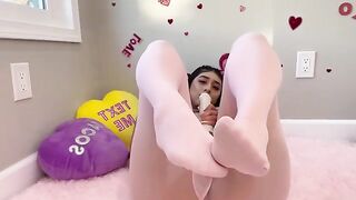 Violet Myers caresses herself in honor of Valentine's Day, showcasing her curvy Latina beauty and passion for sensual, romantic scenes that mirror her anime-inspired alter ego as a "real life hentai girl."