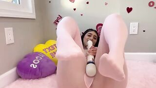 Violet Myers caresses herself in honor of Valentine's Day, showcasing her curvy Latina beauty and passion for sensual, romantic scenes that mirror her anime-inspired alter ego as a "real life hentai girl."