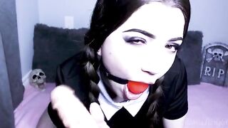 Wednesday Addams gets her pussy stuffed with a big toy by a horny cam girl
