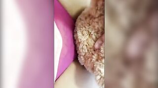 A girl is fucking with her favorite teddy bear, craving more