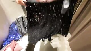 Babe chooses a new dress in the fitting room and gets fucked