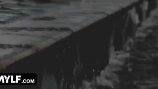 A busty MILF seduces the young pool guy in a steamy scene