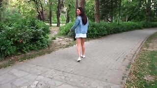 A quick blowjob in the park with a hot brunette, taking a cum shot in her mouth