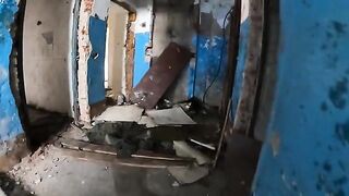 An exhibitionist girl is walking around a horrible building with her sexy bbe