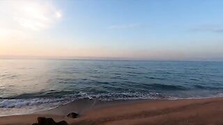 A girl is fucking on the beach and gets caught by a couple