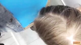 Public blowjob with a petite girl in a shop changing room, caught on camera