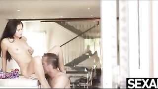 The girl was fucked over the kitchen counter, showcasing intense doggy-style action