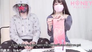 An Asian woman tried to squeeze juice from a fresh young guy