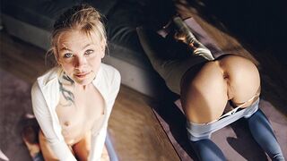 A cute little girl is having fun with her yoga pants