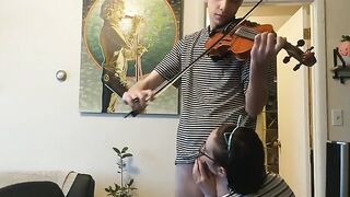 Passionate violin practice interrupted by eager girlfriend