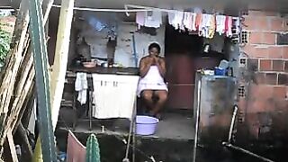 A black girl did not know that there was a secret camera in the room