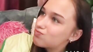 A young girl has sex with her adult man on the couch passionately