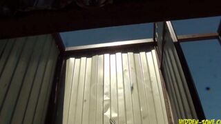 A girl was secretly filmed on the beach in a cabin
