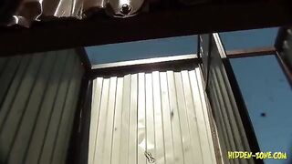 A girl was secretly filmed on the beach in a cabin