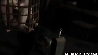 A slave in a cage is at the mercy of his master