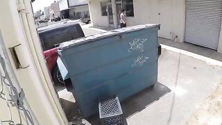 The couple got intimate behind the garbage tank, unaware they were being captured