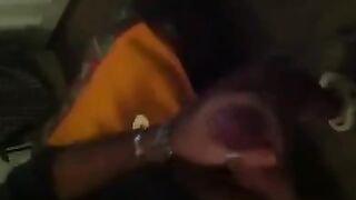 The guy masturbates in front of the mirror with passion