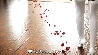 A cheerful young brunette has sex directly on the bed with a guy
