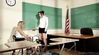 A girl is fucking with her lesbian teacher on the table