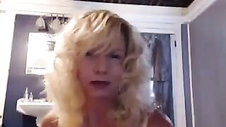 A woman of experience pleasures herself in the bathroom, feeling amazing