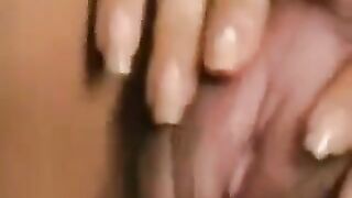 A girl with a big clitoris gets her hairy pussy licked
