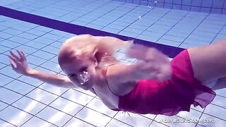 Helen went swimming in the pool completely naked without any swimwear