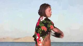 The member shows the girl in a private beach setting