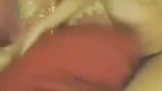 Young Chinese girl masturbating in front of her webcam
