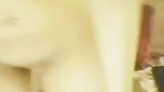 Young Chinese girl masturbating in front of her webcam