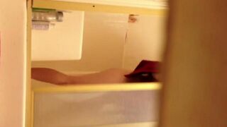 A hidden camera captured a intimate moment of a girl in the shower