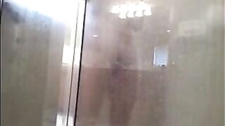 A man washed his body in the shower, not suspecting a camera