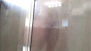 A man washed his body in the shower, not suspecting a camera