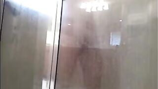 A man washed his body in the shower, not suspecting a camera
