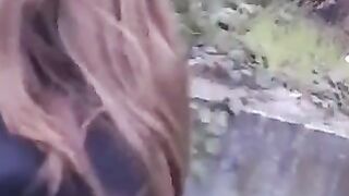 A girl isn't ashamed to lick someone's cock in public place