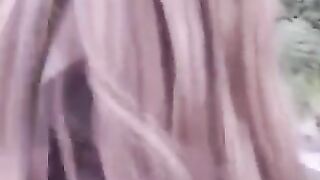 A girl isn't ashamed to lick someone's cock in public place