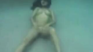 Sex in the ocean with a busty brunette, it’s a sight to see
