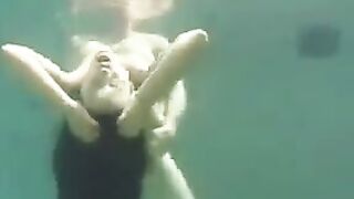 Sex in the ocean with a busty brunette, it’s a sight to see
