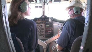 Blonde with big tits is having sex with a man on the plane