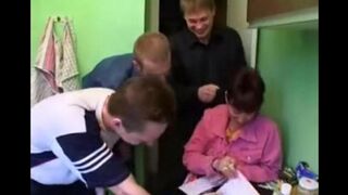 Russian mother fucked by four men in a steamy kitchen scene