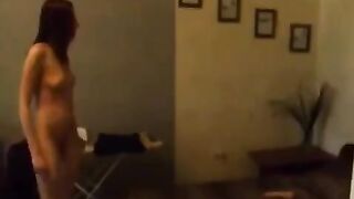A cute Russian girl caresses herself in the kitchen, feeling great