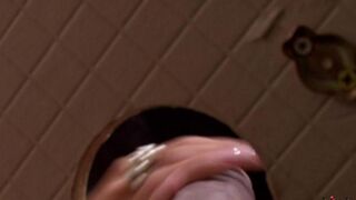 The beautiful woman has sex right in the toilet bowl