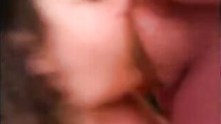 The man stuck his friend's dick in her mouth and she sucked it