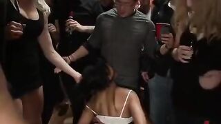 A mature woman is fucking with a crowd of young guys
