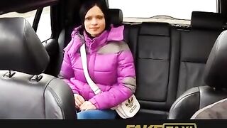 A hot girl is having fun with her taxi driver in his car