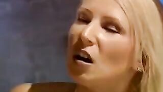 The beautiful woman is tied up and fucked by two men hard