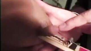 A man uses force to assert dominance over a woman with big tits