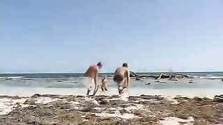 Babe Mzhm has sex on the beach with two guys in group sex