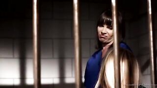 Appetizing girls are fucking in a prison cell, showcasing their passion