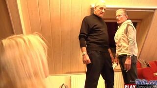 A young blonde has sex with a man with a beard